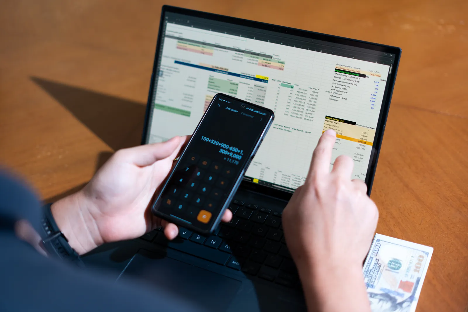 Working through a compensation spreadsheet with a calculator